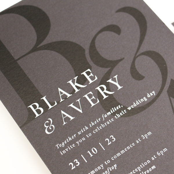 Sleek Black Monogram Wedding Invitation