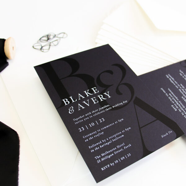 Sleek Black Monogram Wedding Invitation